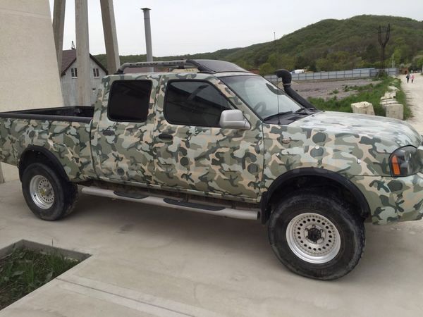 Фото Nissan Frontier King Cab пикап 2-дв. 2 поколение 