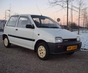 Фото Daihatsu Cuore 3d хетчбэк L200 